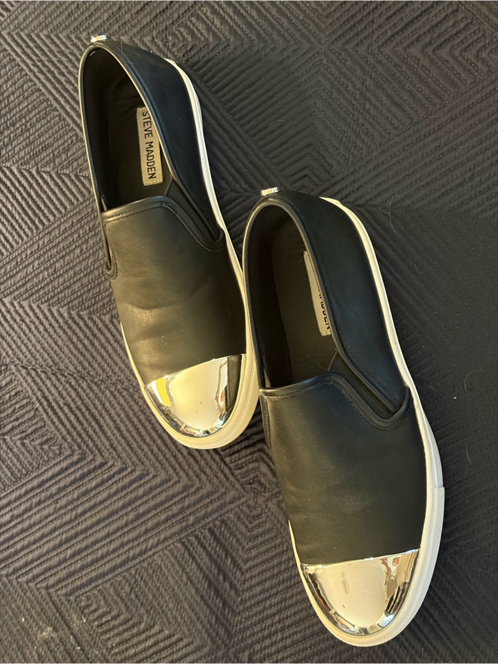 Steve Madden Black Slip-On Sneakers with Gold Metallic Cap Toe